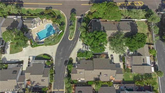 Aerial overview of property's location with a pool area
