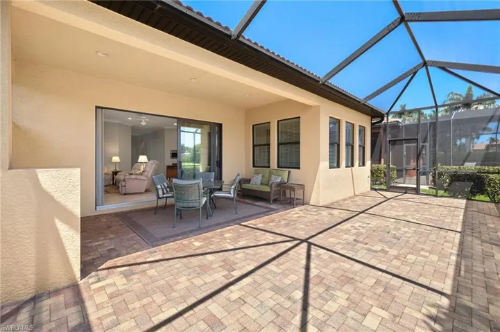 View of patio / terrace with a lanai