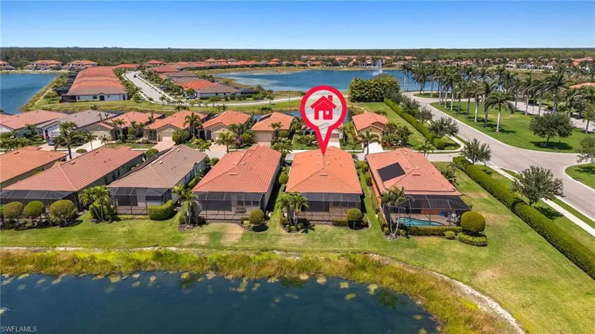 Aerial view featuring a residential view and a water view
