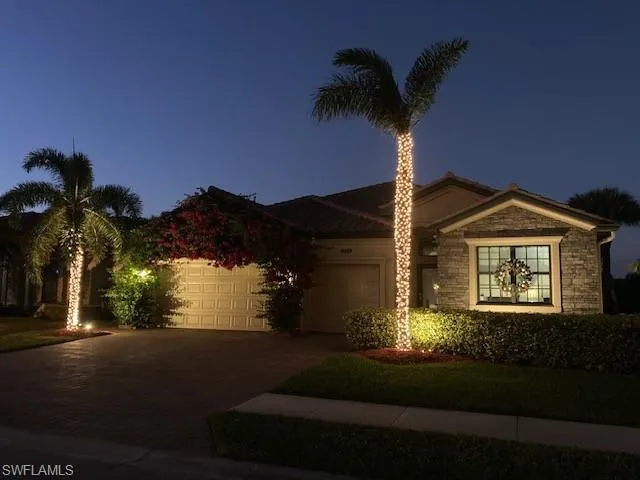 View of front of home featuring a garage