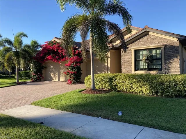 View of front of home featuring a front lawn