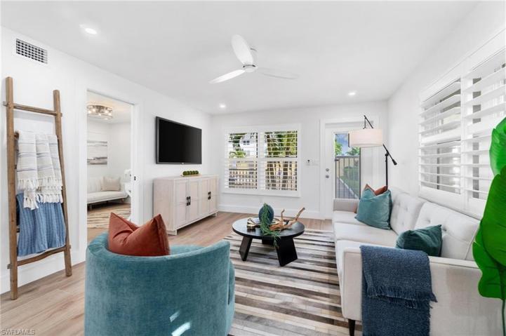 Open floorplan with private door to fenced in pool area.