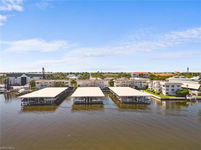Covered and deeded boat slip affords direct deep water access from the inter coastal in Olde Naples.