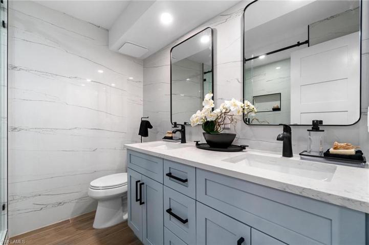 *** RARE double vanity with HUGE frameless glass full tile shower delivers a high end coastal modern feel.