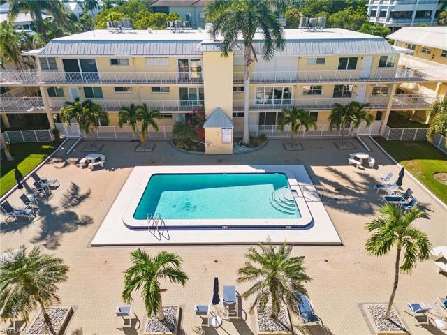 Community pool with large paver patio for sunning or entertaining.