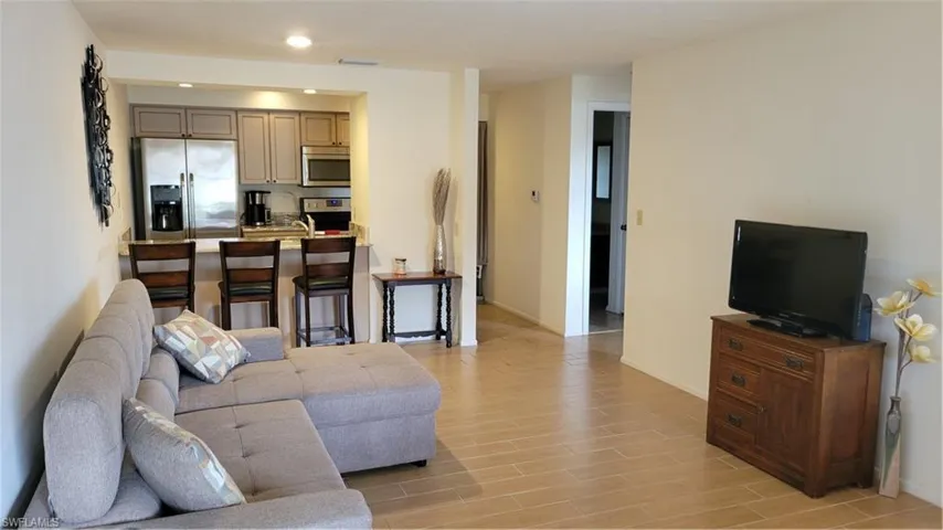 Living room featuring wood-look tile