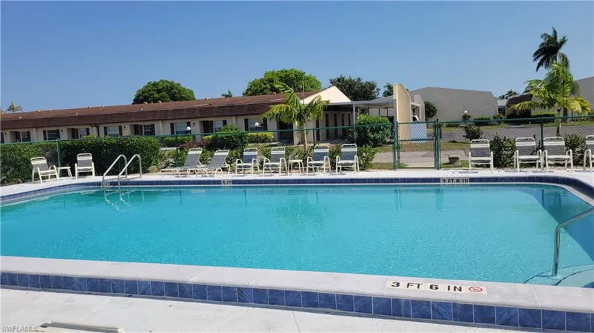 View of swimming pool located right next to the building