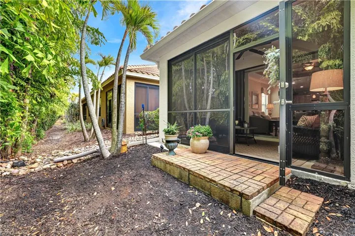 View of patio / terrace featuring a sunroom