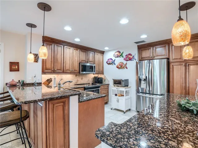 Stainless steel appliances and under cabinet lighting