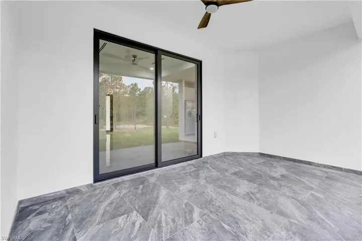 View of patio with ceiling fan