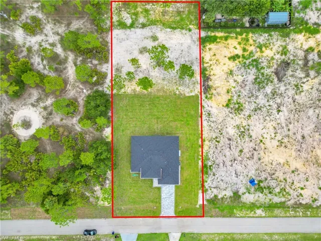 Aerial view of property's location featuring property parcel outlined