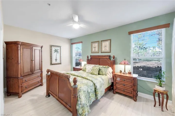 Bedroom featuring light wood-style flooring and ceiling fan