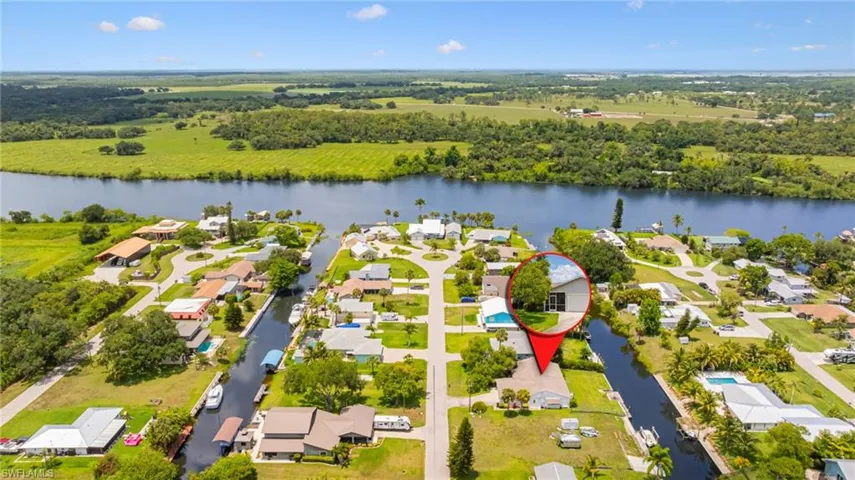 Aerial view of residential area with a nearby body of water