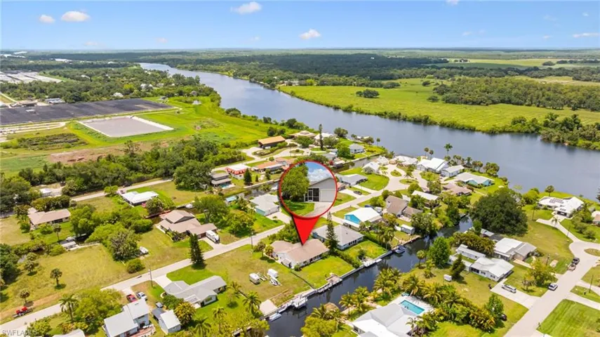 Aerial view of residential area with a nearby body of water