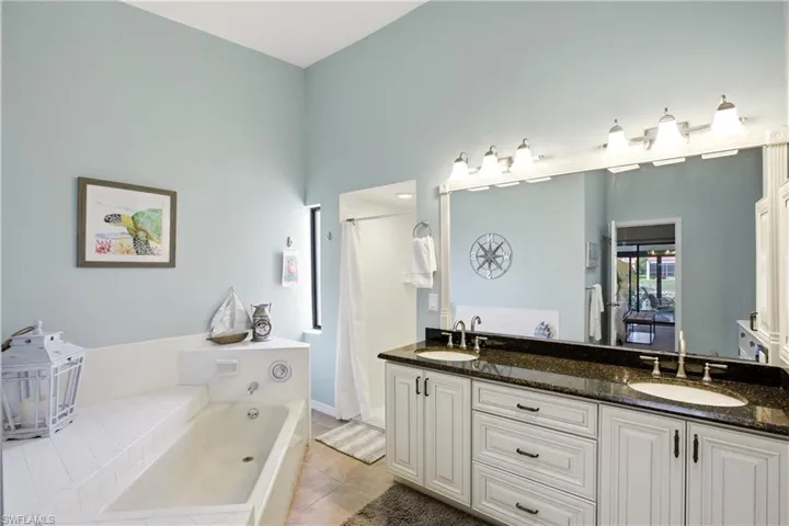 Dual sinks, tub and separate shower