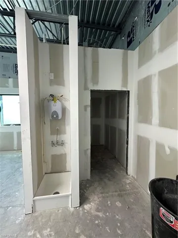 Bathroom featuring concrete floors