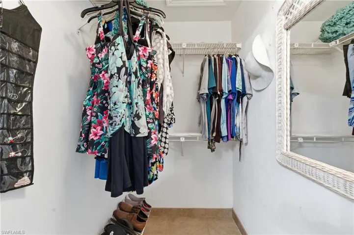 Walk in closet featuring tile patterned floors