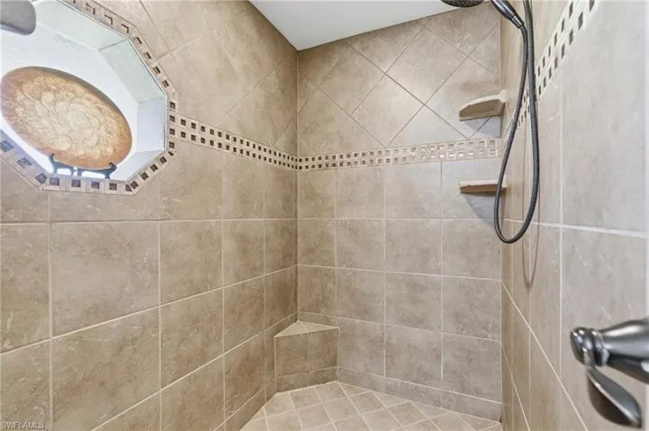Bathroom with tiled shower