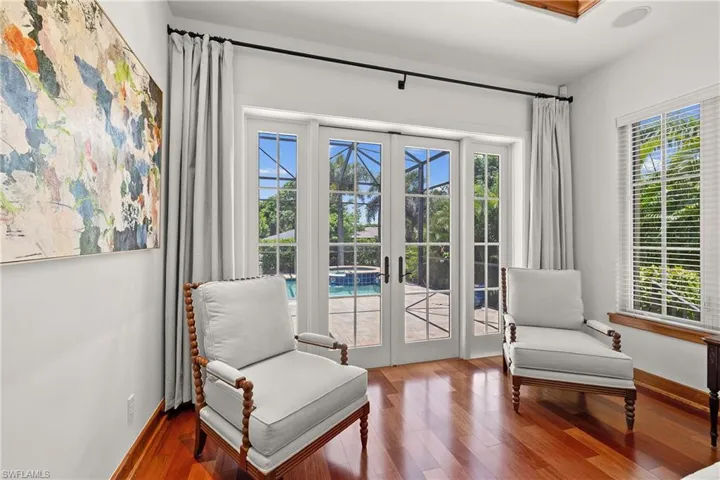 Living area with French doors and Brazilian Cherry Wood floors