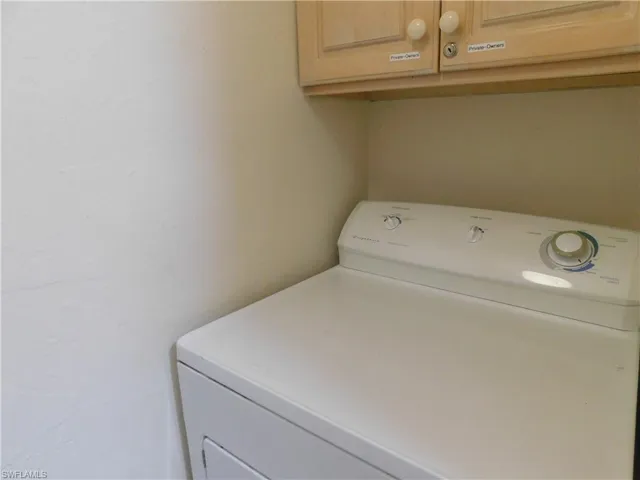 Laundry area featuring washer / dryer