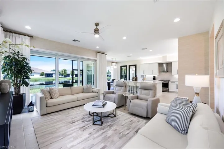 Great Room with electric window coverings on slider