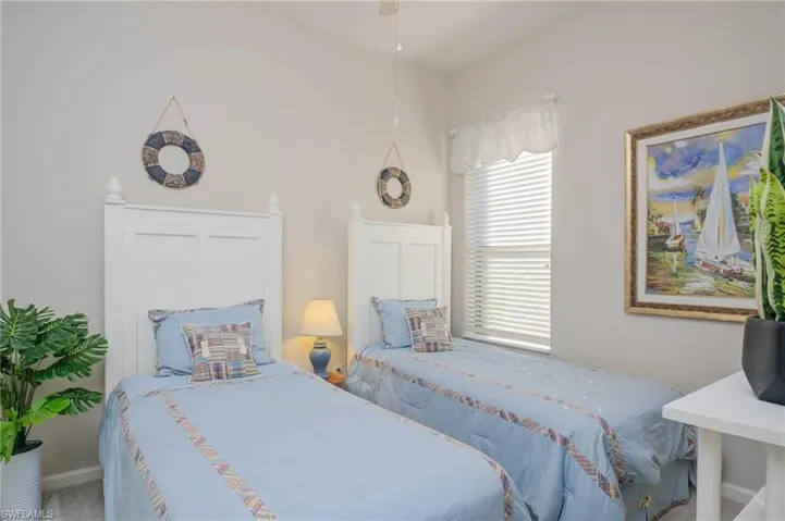 Bedroom featuring carpet flooring and ceiling fan