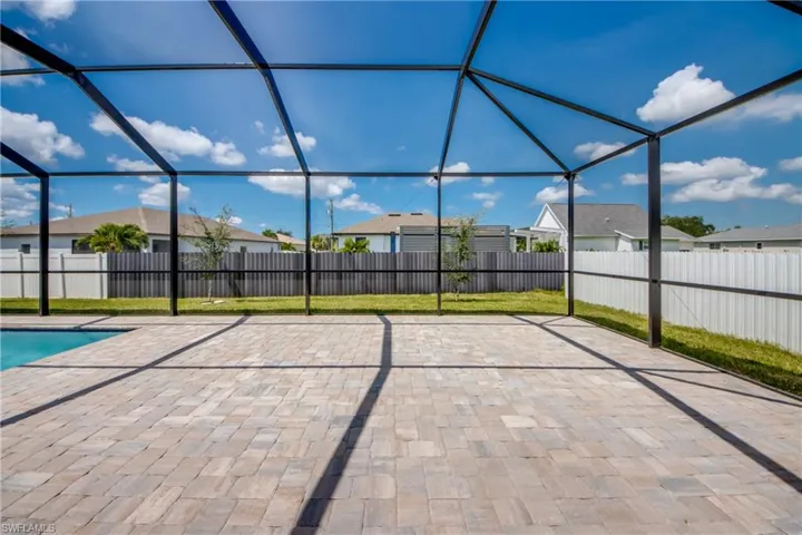 Unfurnished sunroom with a residential view
