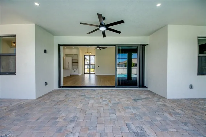View of patio with ceiling fan