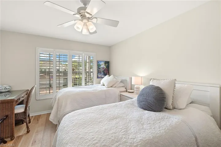 Former Cormorant Den has been converted to a lovely guest bedroom with a walk-in closet.