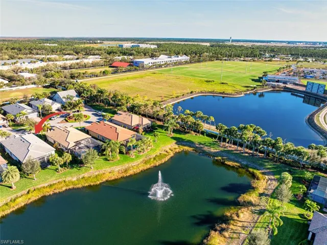 Bird's eye view of a large body of water and a tree filled landscape