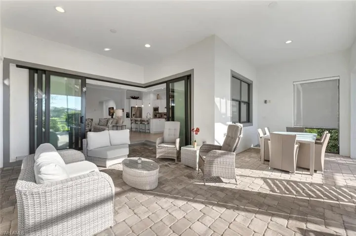 View of patio featuring outdoor dining space and outdoor lounge area