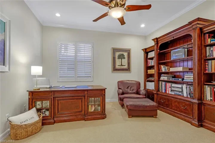 Office with ceiling fan, light carpet, crown molding, and recessed lighting