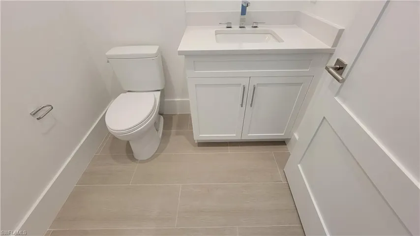 Powder Room close to the flex room/Den/Study