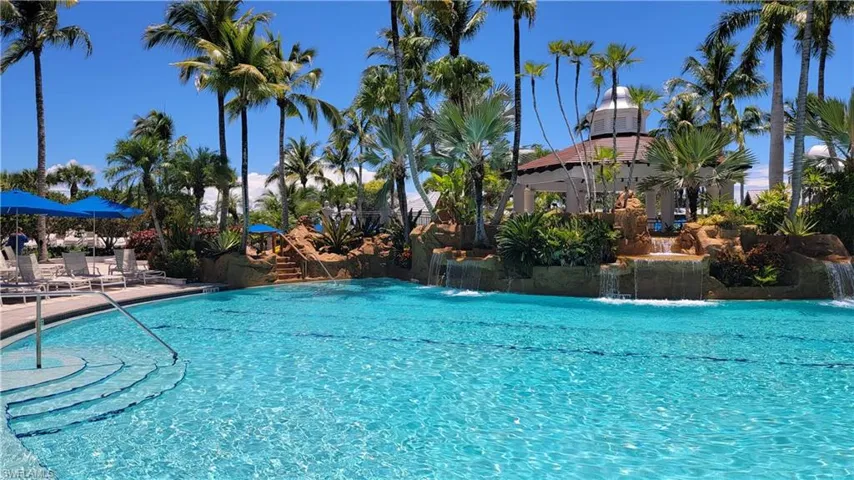 View of Fiddler's Creek swimming pool with water feature for the kids, young and old