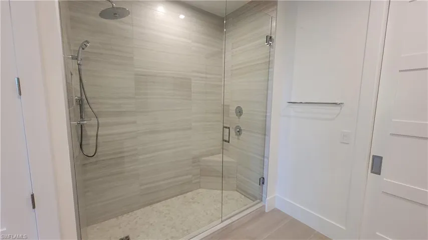 Bathroom featuring an enclosed shower