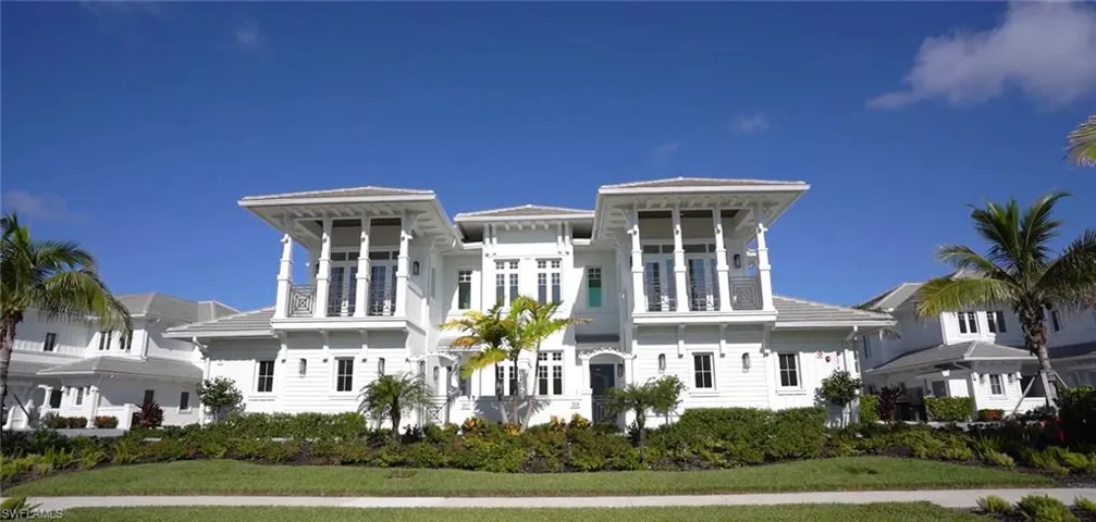 View of front of home with a balcony