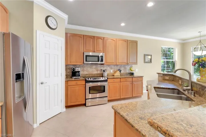 5730 Lago Villaggio Way, Naples, Florida 34104