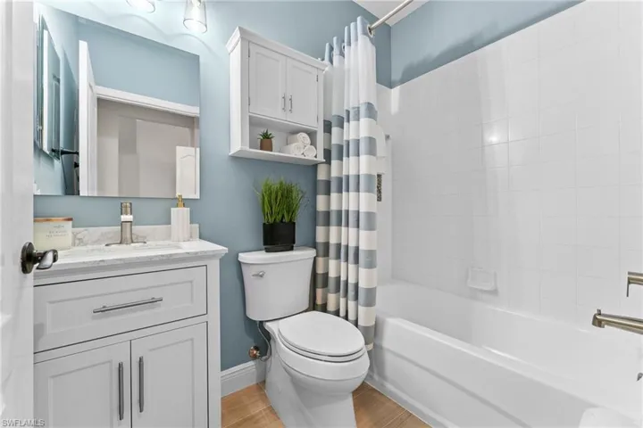 Guest Bathroom renovated, tile floors, new vanity, mirror, lights, toilet, cabinet, tub re-glazed, all Moen fixtures.