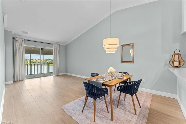 Combo living / dining area with gorgeous water view. West facing - beautiful sunsets.