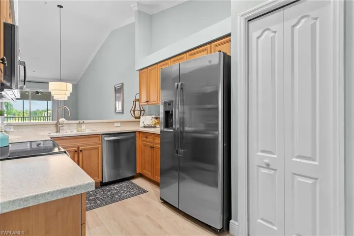 All Stainless appliances. Corian countertop. Tiled floors throughout.