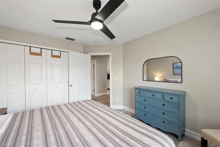 Bedroom featuring a closet and ceiling fan