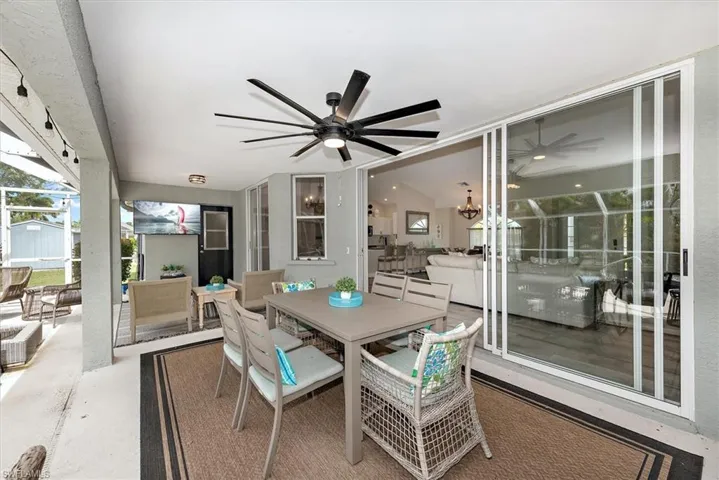 View of patio / terrace with a ceiling fan and outdoor dining area