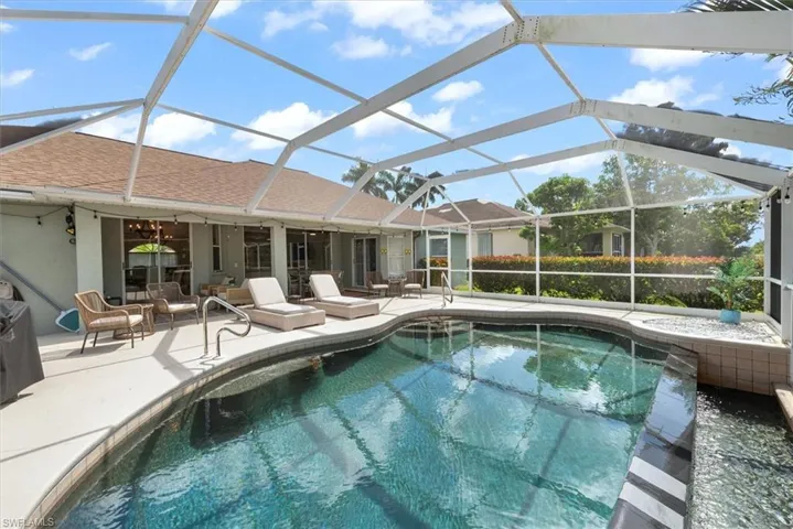 Outdoor pool featuring a patio area