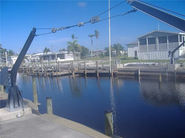 View of club house, pool,  spa and pickleball