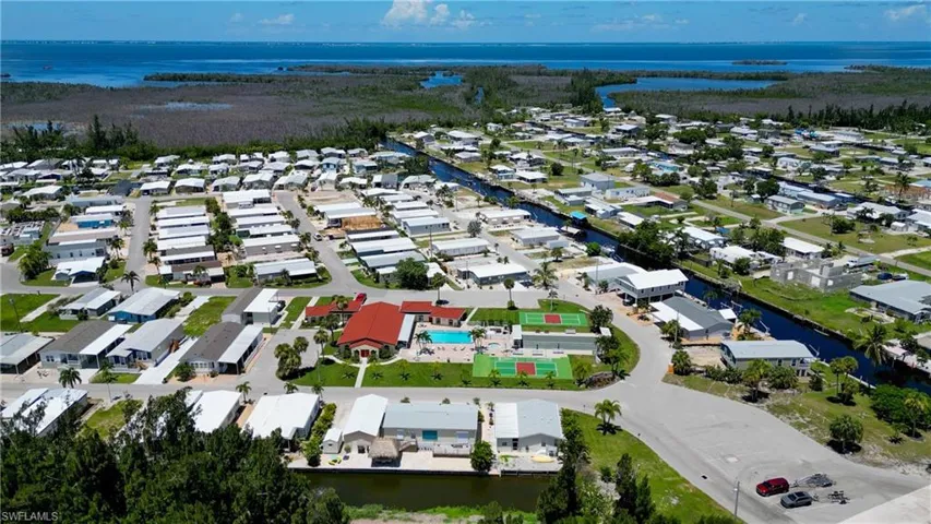 Aerial view of residential area with a nearby body of water