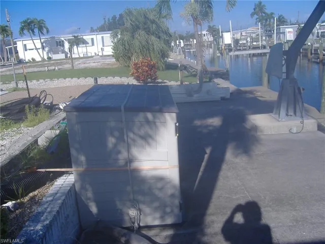 Community salt water pool featuring a patio