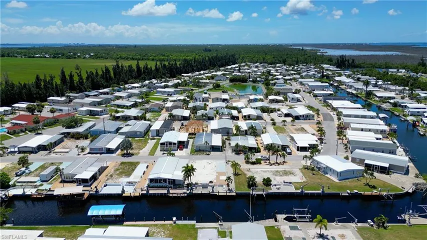 Aerial view of residential area with a large body of water