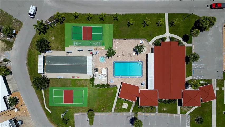 Aerial overview of property's location featuring nearby suburban area