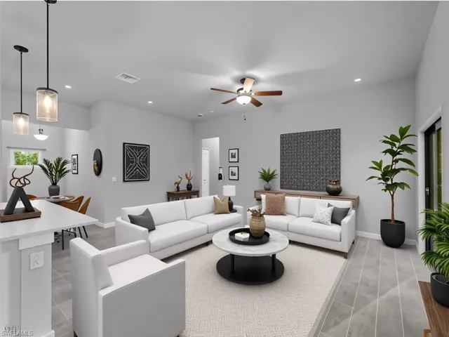 Virtually staged Living area with recessed lighting and a ceiling fan