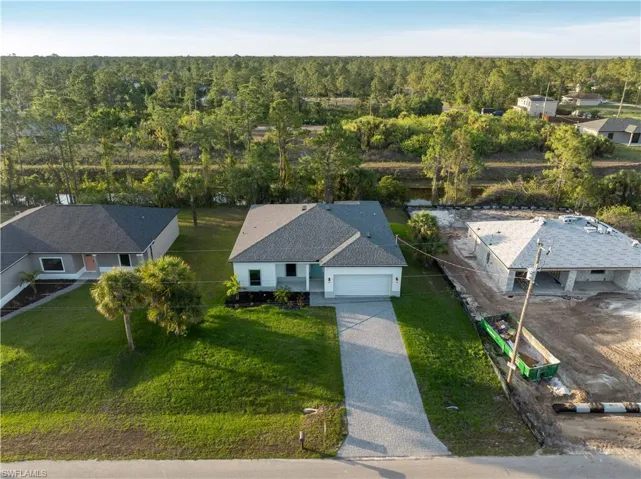View from above of property featuring a forest